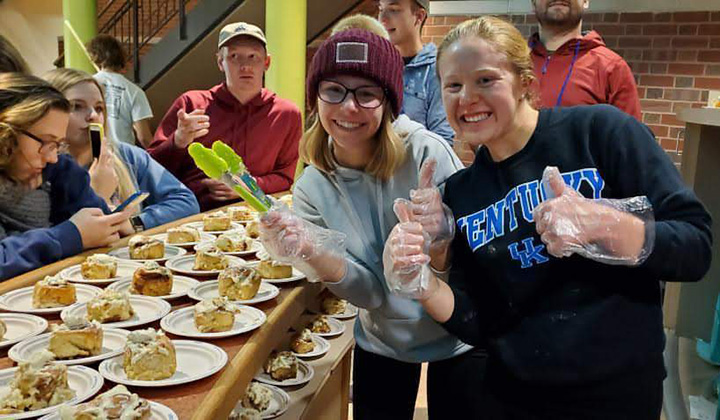 Students enjoying food at Phat Tuesday